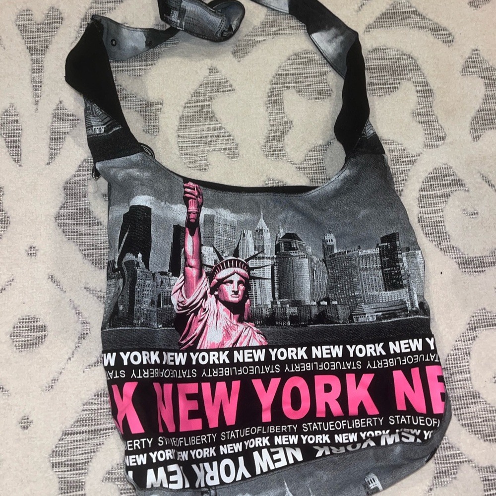 new york sachel purse pink and black